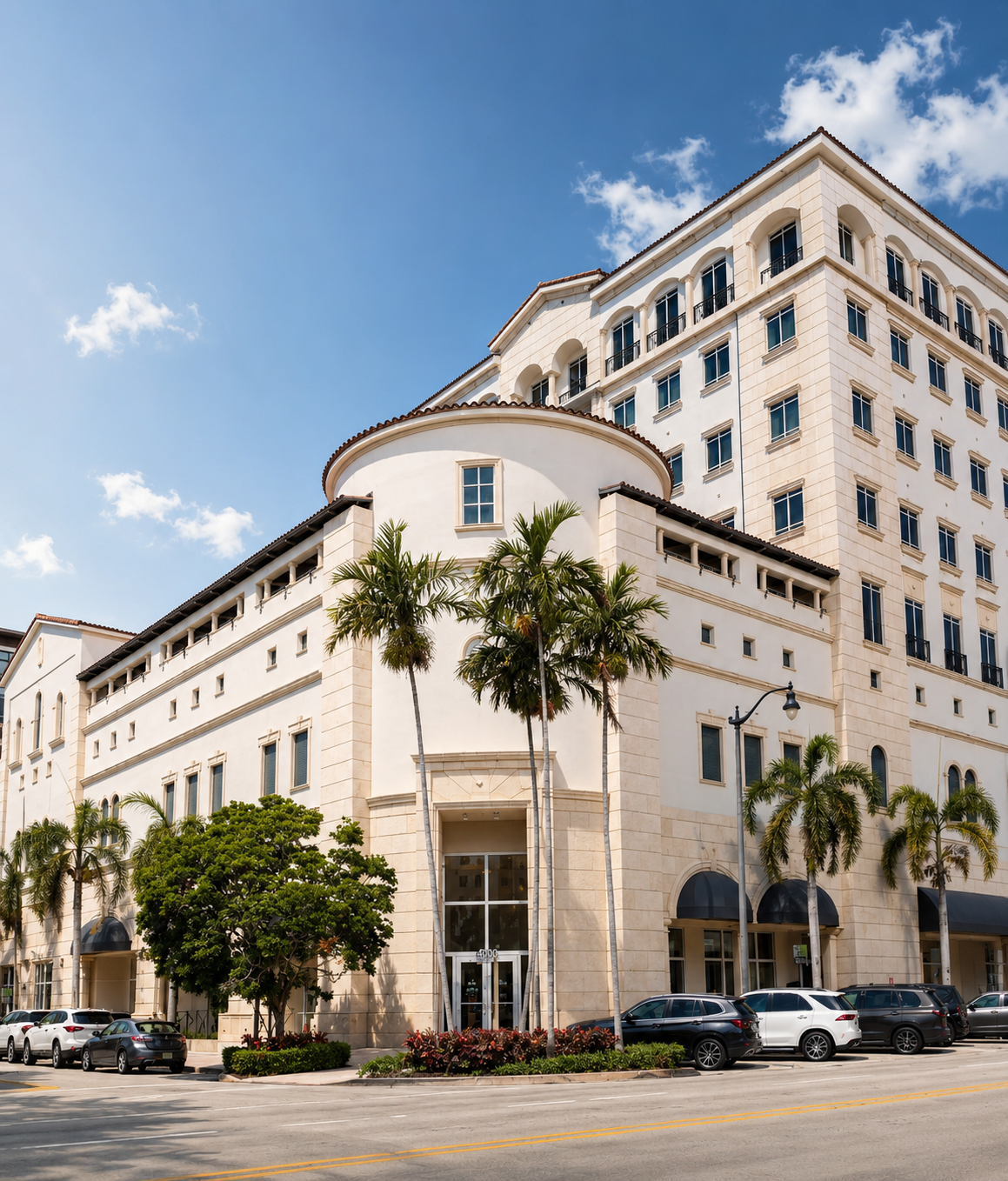 4000 Ponce exterior with palms and Mediterranean architecture